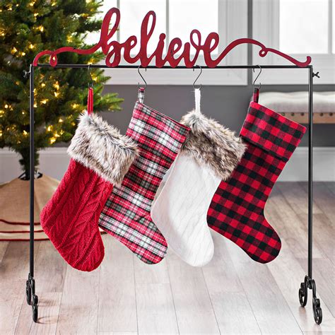 xmas stockings|xmas stocking hangers.